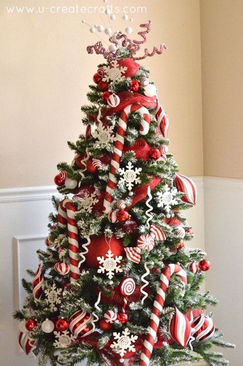 Peppermint Snow Candy Cane Christmas Tree. See 15 Amazing Christmas Tree Ideas on www.prettymyparty.com. Red And White Christmas Tree, Amazing Christmas Trees, Christmas Tree With Snow, Candy Cane Christmas Tree, Red And White Christmas, Peppermint Christmas, Label Christmas, Unique Christmas Trees, Candy Cane Christmas