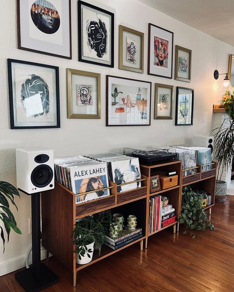 Another shot from @lukegabrieli Bought 3 units? Bought 1? Send us a photo of your setup, we love to see them all! #recordconsole #records #vinyl #mcm #midcenturymodern #furniture #walnut #recordcabinet #bohemian #vinylcabinet #recordstorage #recordstorage #music #lp #fyp #recordcollection #vinylcollection #homedecor #design #midcentury #alexlahey Plants And Vinyl Records, Records Display Ideas, Vinyl Collage Wall, Apartment Vinyl Record Collection, Vinyl Record Bookshelf, Hi Fi Setup, Boho Music Living Room, Record Hanging Ideas, Guitars In Living Room