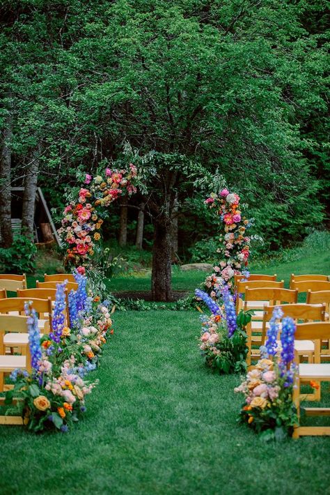 Love bright wedding florals? | Vermont Weddings | Explore the colorful wedding flowers in this intimate castle wedding. Get inspiration for a wedding flower arch, wedding flower bouquets and floral table settings for your wedding here: https://vermontweddings.com/blog/castle-wedding-vermont/ Bright Colorful Wedding, Design Home Ideas, Wildflower Wedding Theme, Turkey Wedding, Floral Arch Wedding, Colorful Wedding Flowers, Wedding Ceremony Arch, Eclectic Wedding, Arch Wedding