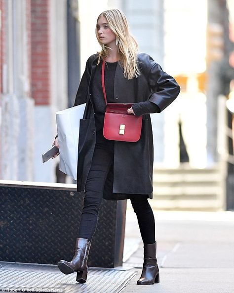 Seeing red! The 27-year-old Victoria's Secret Angel looked chic in her monochrome ensemble but added a pop of colour to her look with a bright rosy handbag Red Celine Bag Outfit, Small Red Purse Outfit, Bright Bag Outfit, Black Outfit Red Bag, Pop Of Color Bag Outfit, Red Handbag Outfit Street Style, Burgundy Bag Outfit Street Style, Red Bag Street Style, Red Bag Outfit Ideas