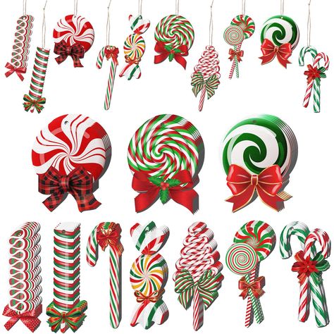 Christmas Candy Themed Decor, Candy Decorated Christmas Tree, Hard Candy Christmas Decorations, Candy Cane Christmas Wreath, Candyland Decorations Christmas, Red And Green Christmas Tree Decorations, Extreme Christmas Decorations, Candy Cane Lane Christmas Decor, Christmas Archway Decor Indoor