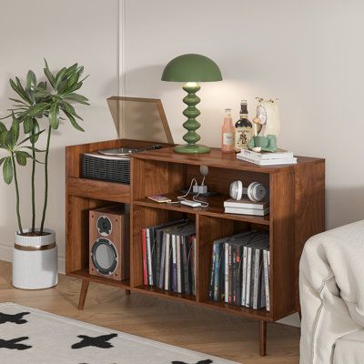 Vinyl Record Rack and Storage: Features an elegant multi-purpose design that can easily blend into different environments. Its classic look and colour complement a variety of home styles. Not only can it be used as a vinyl storage cabinet, the mid-century modern turntable rack with record storage can also be used as a decorative piece or small piece of furniture to add a unique touch to your room. | George Oliver Audio Rack, Record Player Stand w/ Charging Station & Usb Ports Brown 29.52 x 45.27 Record Stand Table, Vinyl Record Console, Vynil Record Holder, 1970s Record Player Cabinet, Vinyl Rack Storage, Midcentury Modern Record Storage, Vinyl Storage Cabinet, Retro Record Player Cabinet, Mid Century Modern Stereo Cabinet