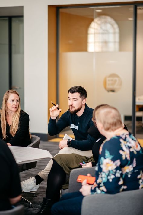 Corporate event with teams in a breakout area Corporate Events Photography, Company Photoshoot Ideas Fun, Company Team Photoshoot Ideas, Corporate Event Photography Ideas, Corporate Office Photoshoot, Fun Corporate Photos, Office Photography Ideas, Corporate Team Photos, Office Team Photoshoot