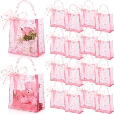 PRICES MAY VARY. Package Includes: you will receive 24 pcs pink glitter gift bags with handles, each measuring about 5.9 x 2.8 x 6.3 inch/ 15 x 7 x 16 cm (length x width x height), suitable for gift and storage use; This set also includes 2 rolls of pink ribbons, each measuring 2.4 inch/ 6 cm wide and 10 yards long, making it a stylish bag decoration Quality Material: these glitter totes are made of reliable waterproof PVC material, durable, reusable, practical, and easy to clean; The sturdy han Lana Del Rey, Princess Theme Goodie Bags, Pink And Pearls Birthday Party, Pink Party Favors For Adults, Baby Shower Gift Bags For Guests, Small Gift Bag Ideas, Pink Birthday Gifts, Birthday Gifts For Your Mom, Pink Minnie Mouse Birthday Party