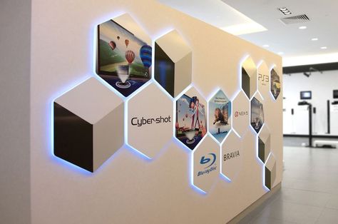 Interesting back-lit wall signage for SONY Interactive Wall Design Office, Exhibit Wall Design, Creative Office Interior Design Ideas, Office Foyer Design, Booth Wall Design, Interactive Office Wall, Wall Signage Design, Exhibition Wall Design, Office Mural Design