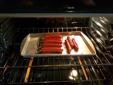 These are my personal favorite way to cook a hot dog.  The skin becomes crisp while the interior remains extremely juicy.  They are more on the well done side because that’s how I like them.  If you prefer them not as well done reduce the cooking time and keep an eye on them.  Enjoy! Hot Dogs In Oven, Broiled Hot Dogs, Oven Hot Dogs, Baked Hot Dogs, Ground Beef Breakfast, Baby Bbq, Thm Meals, Making Hot Dogs, Grilling Hot Dogs