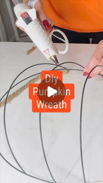 Olivia Parazine on Instagram: "Easy and affordable DIY Dollar Tree pumpkin wreath! Happy crafting! 🍂🎃 #DIYFallDecor #DollarTreeCrafts" Loop Yarn Fall Wreaths, Dollar Tree Fall Decor Diy Halloween Decorations, Pumpkin Wire Wreath Form Diy, Pumpkin Yarn Wreath, Pumpkin Wreaths Diy Dollar Stores, Dollar Tree Wire Pumpkin Wreath, Wired Pumpkin Wreath Diy, Wire Pumpkins From Dollar Tree, Pumpkin Frame Craft