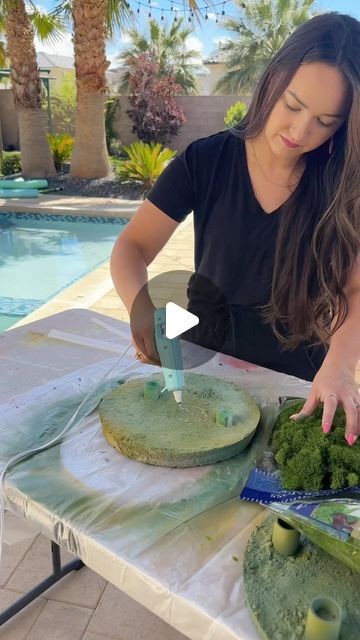 Kim Coffin | Cricut, Sewing, Crafts, & DIY on Instagram: "Here’s how I make the cement bases for my giant standing flowers. 🌸 

You can buy premade metal bases for the giant flowers online but they are pretty pricey so I like to DIY them.

Be sure to check out my other reels on how to make the flowers! 

Follow @sweetredpoppy for more crafting inspiration!

#diycrafts #giantflower #standingflower #crepepaperflower #crepepaper #giantflowers" Giant Flowers For Wedding, Giant Flower Stand Diy, Diy Giant Flower Petals, Floral Mirror Diy Fake Flowers, Giant Silk Flowers Diy, How To Make Life Size Flowers, Making Giant Flowers, Giant Outdoor Flowers Diy, Crepe Flowers Diy Giant