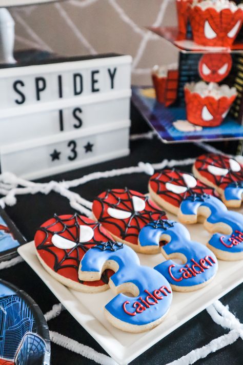 Spider man birthday party dessert cookies decor Spider Man Themed Birthday Party Ideas, Spider Man 3rd Birthday Party Cake, 1st Birthday Spiderman Theme, Spiderman And Frozen Birthday Party, Modern Spider Man Birthday Party, Marvel Third Birthday Party, Vintage Spiderman Birthday Party, Spider Man Sleepover Ideas, 2nd Spiderman Birthday