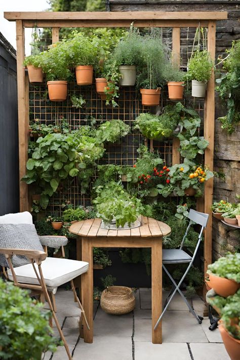 A patio garden can serve as an extension of your living space, offering a tranquil retreat for relaxation or entertaining. This post contains 21 ideas to help you create the perfect patio garden. Paved, small, cottage, back, apartment, a budget, layout, front, raise, UK, seating areas, flower pots, with steps, fire pit, bifold doors Apartment Patio Fire Pit Ideas, Small Outdoor Seating Area Front Yards, Small Closed Patio Ideas, Small Back Steps Ideas, Flowers On Terrace, Small Garden Apartment, Plants Outside Front Door Apartment, Uk Patio Ideas, Small Narrow Garden Design