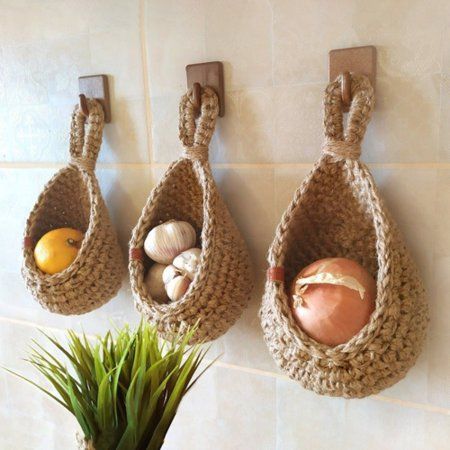 Description: Hand-woven from high quality materials, this hanging basket stores vegetables and fruit and the basket is well ventilated for long storage. Featuring a special teardrop shape, this hanging basket is very decorative and can be matched with most decorative styles, adding a touch of natural charm to your home and is very eye-catching. It is made of high quality braid fabric material. There are 6 different sizes for you to choose. This wall baskets are perfect for onions, garlic, potato Onion Storage, Hanging Wall Baskets, Small Pantry Organization, Food Type, Hanging Fruit Baskets, Jute Hanging, Rustic Kitchen Decor, Boho Kitchen, Handmade Kitchens