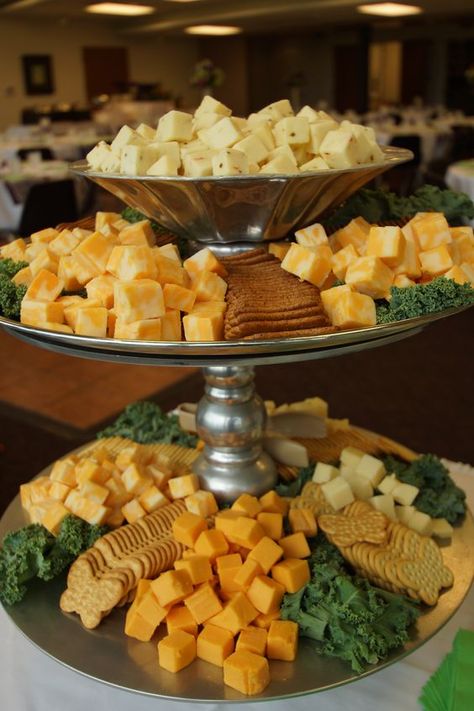 Tiered stand to display assorted cheese cubes and crackers for a summer wedding reception. Hi-Lo Restaurant and Catering. www.hiloclub.com: Elegant Wedding Appetizers, Punch And Cake Reception, Cake And Punch Wedding Reception Ideas, Meat And Cheese Board Wedding, Simple Wedding Food Ideas Buffet, Cheese Cubes Appetizers, Finger Foods Wedding Reception, Wedding Hourdourves, Cake And Punch Wedding Reception