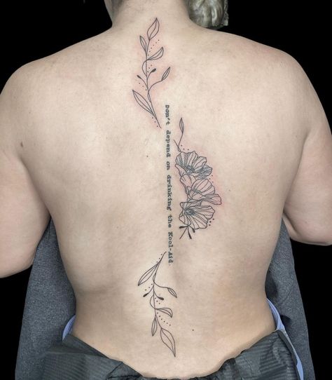 Quote Spine Tattoo With Flower, Adding To Spine Tattoo, Spine Tattoo With Quote And Flower, Floral Spine Tattoo Black Women, Vine Tattoo With Quote, Flower And Words Spine Tattoo, Quote And Flower Spine Tattoo, Word And Flower Spine Tattoo, Vines Around Quote Tattoo