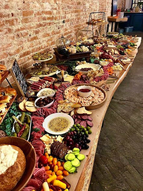 Large table filled with charcuterie, cheese, fruit, nuts, olives, veggies, sliders, dips, butter board, cream cheese board, shrimp cocktail and all the good stuff! Epic Grazing Table, Cheese Board For Wedding, Large Crowd Charcuterie Board, Cheese Tables Ideas, Elegant Grazing Table Wedding, Long Grazing Table, Long Grazing Board, Big Party Charcuterie Board, Reception Grazing Table