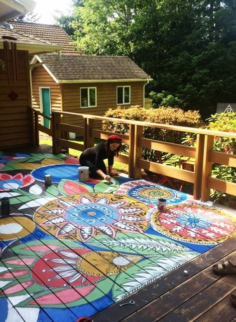 Wow, this painted deck is amazing! It's so bright and colorful. Would you tackle a big project like this? Whatever design you choose, use lots of color and it will look great! #paint #painteddeck #colorful #art #colorfulpainteddeck #deckdesigns #craftgossip Painted Deck, Balkon Decor, Hippie House, Painting Tile Floors, Deck Paint, Deck Projects, Painted Floor, Outdoor Diy Projects, Painted Floors