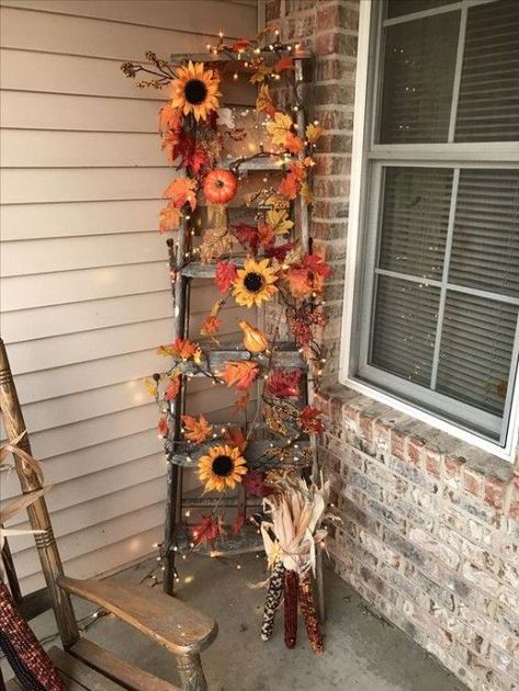 65+ Amazing Thanksgiving Porch Decorations for a Happy Fall | HubPages Wooden Ladder Fall Decor, Outdoor Fall Ladder Decor, Ladder Halloween Decor, Outdoor Seasonal Decor, Fall Ladders Ideas, Fall Porch Ladder Decor, Fall Decor With Ladders, Fall Decor Ladder, Fall Lawn Decorations