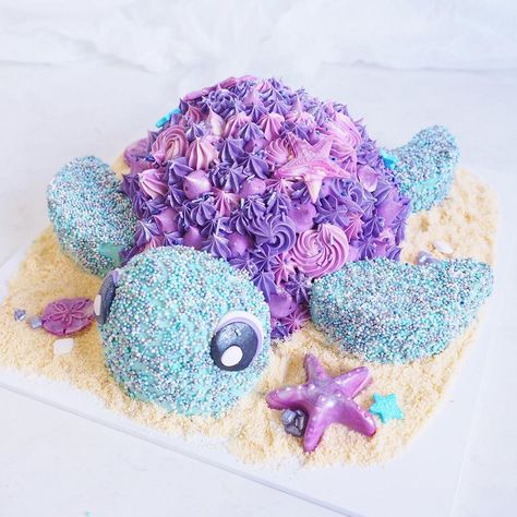 Sprinkle Me’s Instagram photo: “Always time for a first and this is my first turtle cake! 🐢 Such a cute little guy 🐚 Adorned with chocolate sea shells.  Inspired by…” Sea Turtle Pull Apart Cupcakes, Under The Sea Sandwiches, Turtle Bday Cake, Sea Turtle Smash Cake, Turtley Two Birthday Party, Turtle Decorated Cake, Turtle Themed First Birthday Party, Two Cute Birthday Cake, Sea Turtle Cupcake Cake