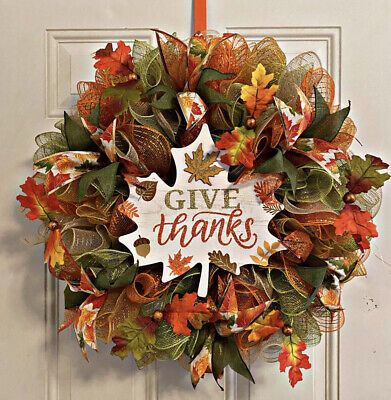 This colorful handmade uniquely gorgeous leaves wreath design is perfect for indoors or outdoors. This wreath is a must have for holiday greetings! Just look at it, can you envision this fall/autumn filled leaves wreath greeting you and/or your guest this holiday season? It definitely has that WOW factor. Always reminding us to Give Thanks!This wreath measures approximately 23in x 23in x 6inThis wreath includes a free orange door hanger that compliments all it's colo Thanksgiving Riddles, Elegant Fall Wreaths, Fall Mesh Wreaths, Fall Deco Mesh Wreath, Orange Door, Fall Deco Mesh, Fall Thanksgiving Wreaths, Leaves Wreath, Deco Wreaths