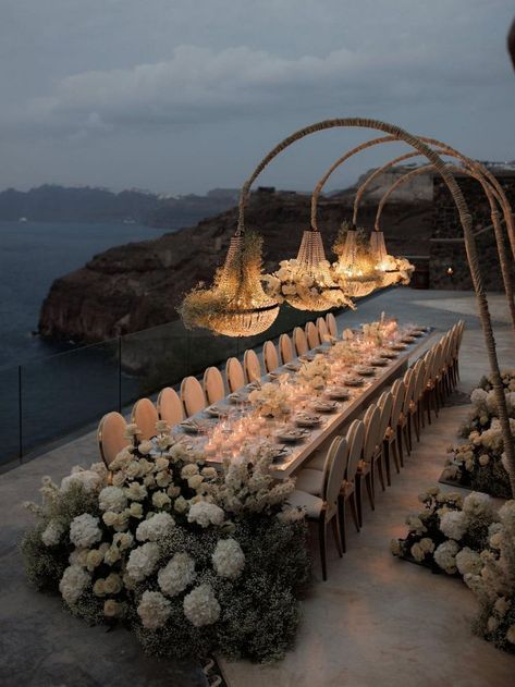 An abundance of white florals complements this romantic wedding reception in Santorini | wedding, wedding inspo, wedding decor ideas, wedding decor, intimate wedding, wedding reception, wedding reception decor, destination wedding, Santorini wedding, romantic wedding decor, romantic wedding, wedding reception ideas, wedding tablescapes, wedding table decor, wedding table centerpieces, luxury wedding reception, white wedding, wedding flowers, wedding floral designs #wedding #weddingreception Seating Arrangement Wedding, Wedding Jitters, Destination Wedding Italy, Wedding In Greece, Romantic Wedding Receptions, Beautiful Wedding Reception, Wedding Reception Seating, Intimate Wedding Reception, The Dream Team