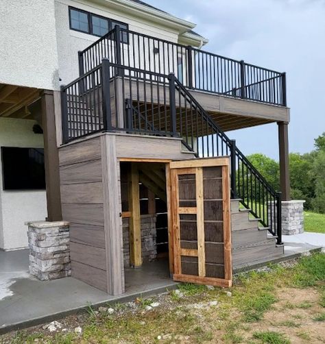 8 Ways To Get Under-Deck Storage – Forbes Home Walkout Basement Patio, Stairs Porch, Under Deck Storage, Patio Under Decks, Outdoor Staircase, Building A Wooden House, Deck Landscaping, Patio Stairs, Wood Decks