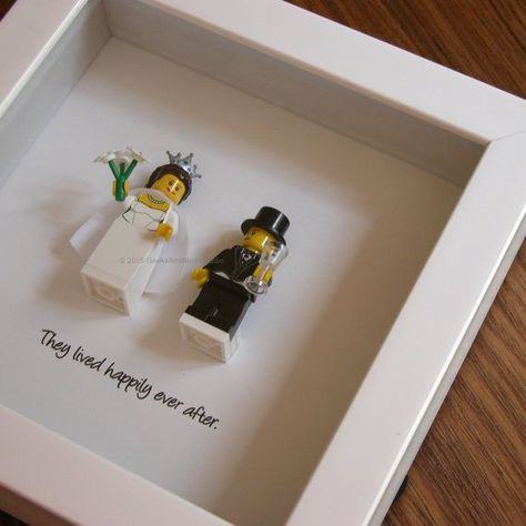 Art frame feature two LEGO®️️ minifigures, Bride and Groom with the a quote: ‘They lived happily ever after beneath. Its the perfect gift for Lego Wedding, Homemade Wedding Gifts, Wedding Gifts For Bride And Groom, Diy Wedding Gifts, Homemade Wedding, Wedding Engagement Gifts, Lego Minifigure, Best Wedding Gifts, Married Couples