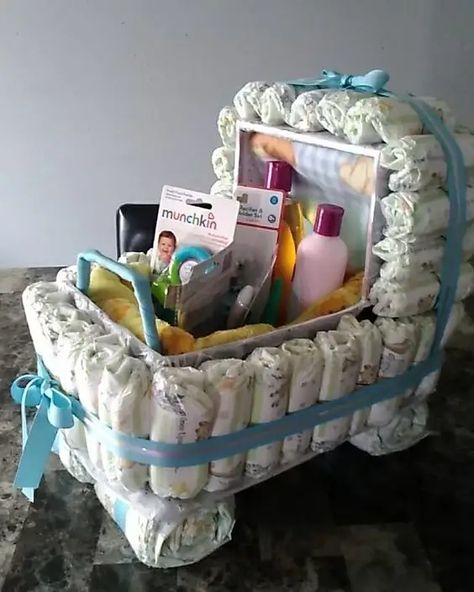 25+ DIY Diaper Cake Ideas that Make a Great Baby Shower Gift - HubPages Diaper Gift Ideas, Tiffany Baby Shower Theme, Diaper Cake Ideas, طفلة حديثة الولادة, Diy Diaper Cake, Diaper Gifts, Idee Babyshower, Baby Shower Baskets, Baby Basket