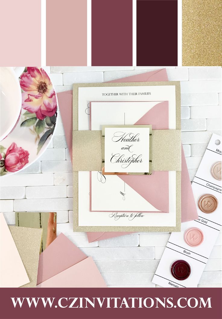 wedding stationery with pink and gold accents