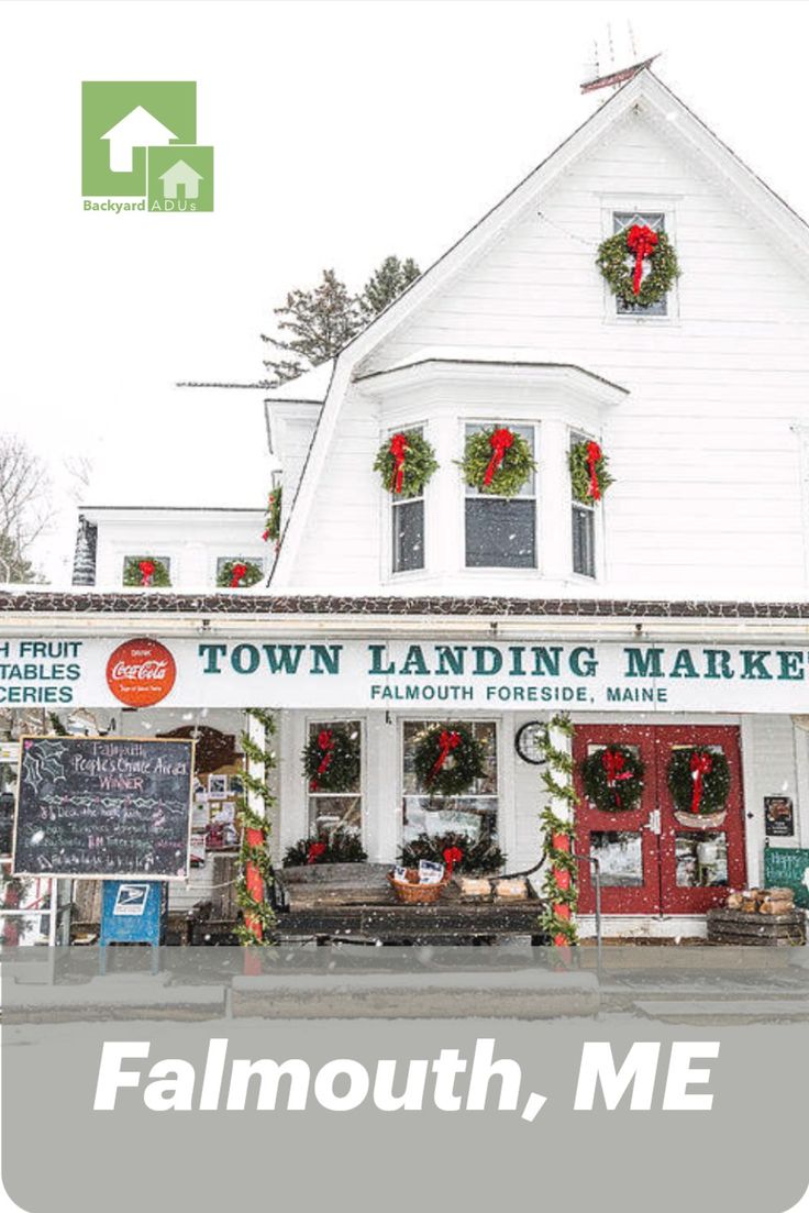 the town landing market in falmouth, me is decorated for christmas and holiday