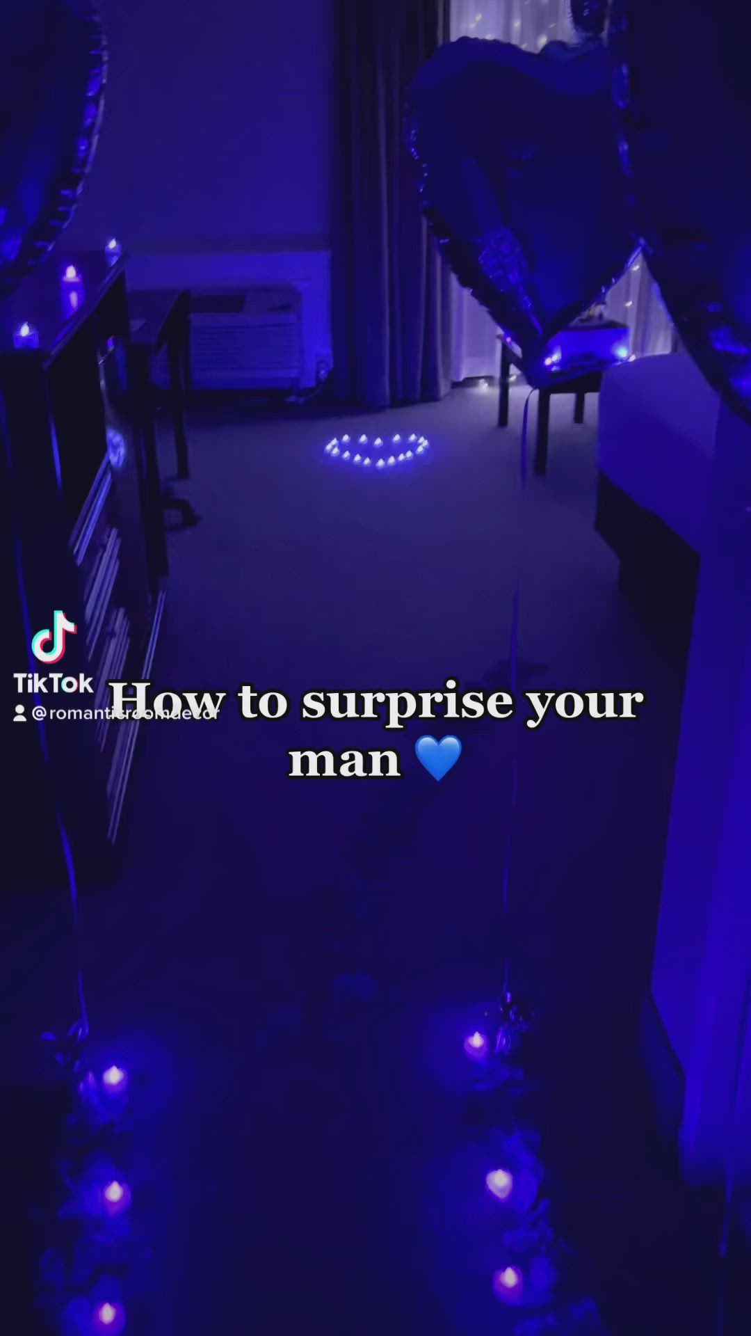 This may contain: a room with blue lights and a quote on the floor that reads, how to surprise your man