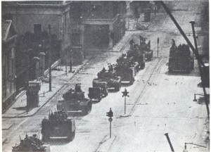 A Black & White photo of tanks rolling in the streets of Greece