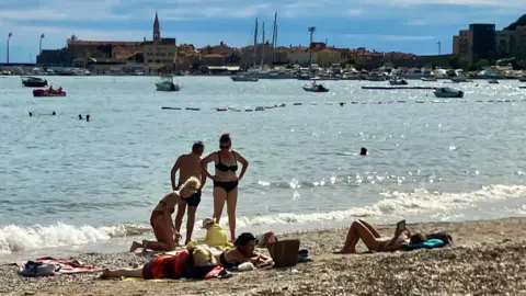 Beach in Budva with view of Old Town and Citadel