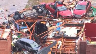 Destroyed house and cars in Oklahoma City