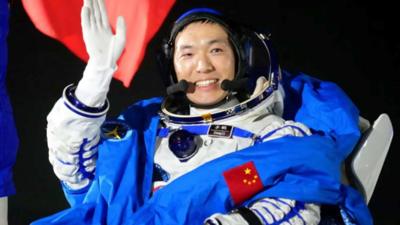  Shenzhou-18 astronaut waving in space gear