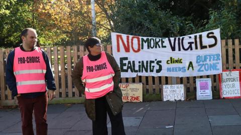 Banners backing a buffer zone around abortion clinics