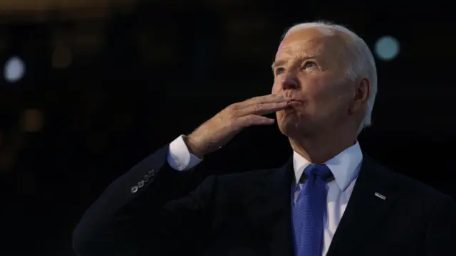 Joe Biden blows a kiss during Day one of the Democratic National Convention