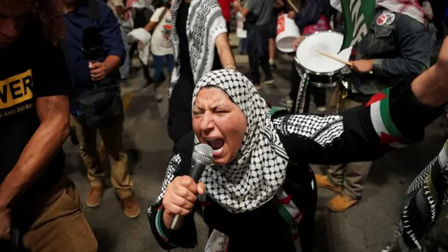 Demonstrators take part in a protest in support of Palestinians in Gaza, on the sidelines of the Democratic National Convention