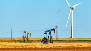 Photo depicts green and fossil energy production