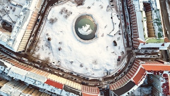 Aerial View Of Temppeliaukion Kirkko Under The Snow Helsinki Finland Aerial View Shutterstock 1042271983