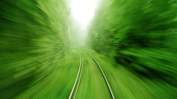 Photo Showing The View From An Express Train On High Speed Shutterstock 57117193