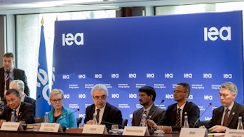 Photo depicts a panel line up of ministers and people for the critical minerals summit