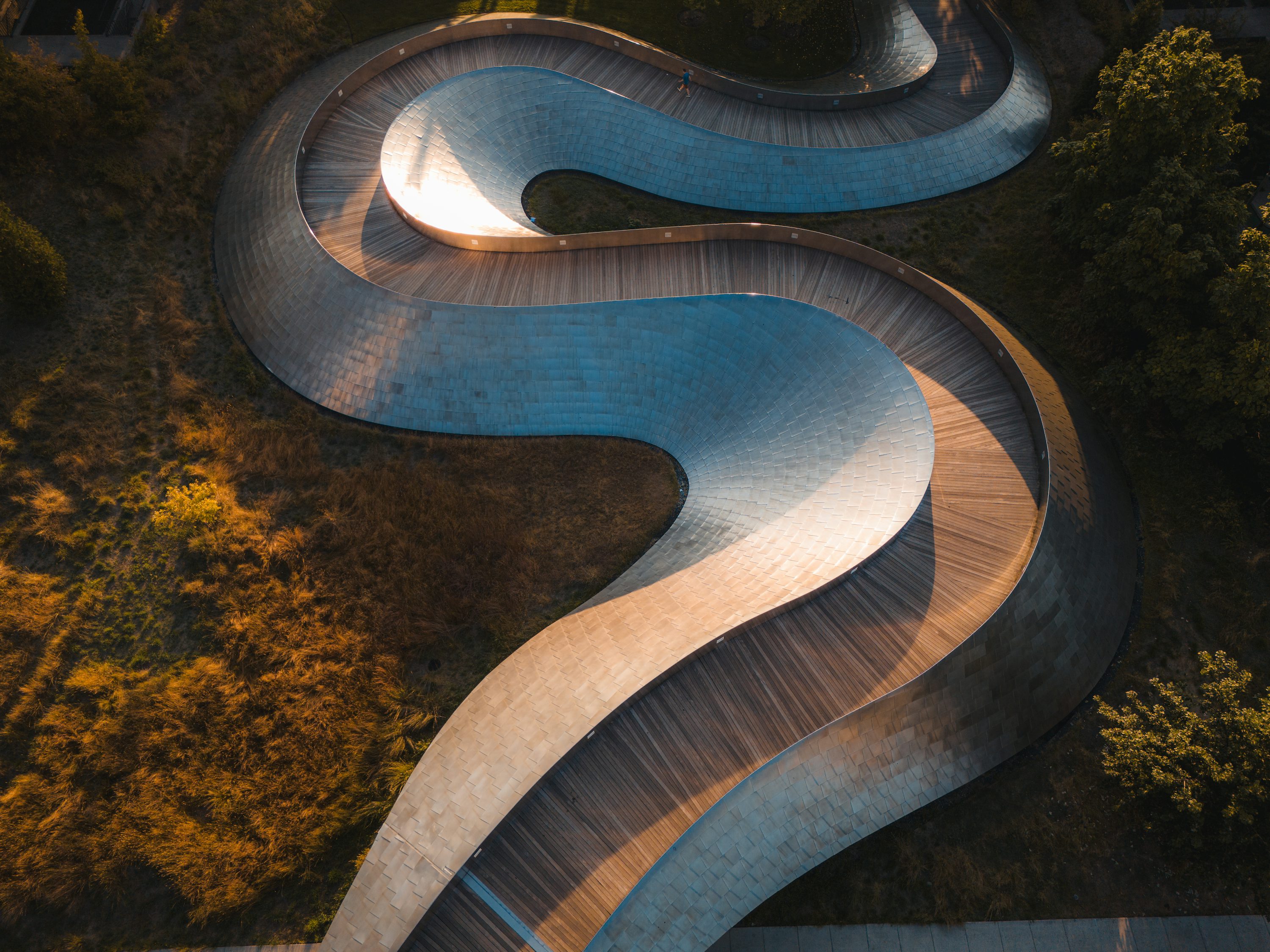 An aerial view of a curved road