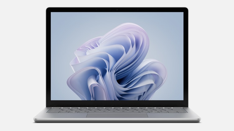 A front view of a Surface Laptop 6 for Business in the 13.5 inch size in the color Platinum.