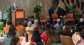 Dean DeShazo addressing the crowd at the annual State of the College.