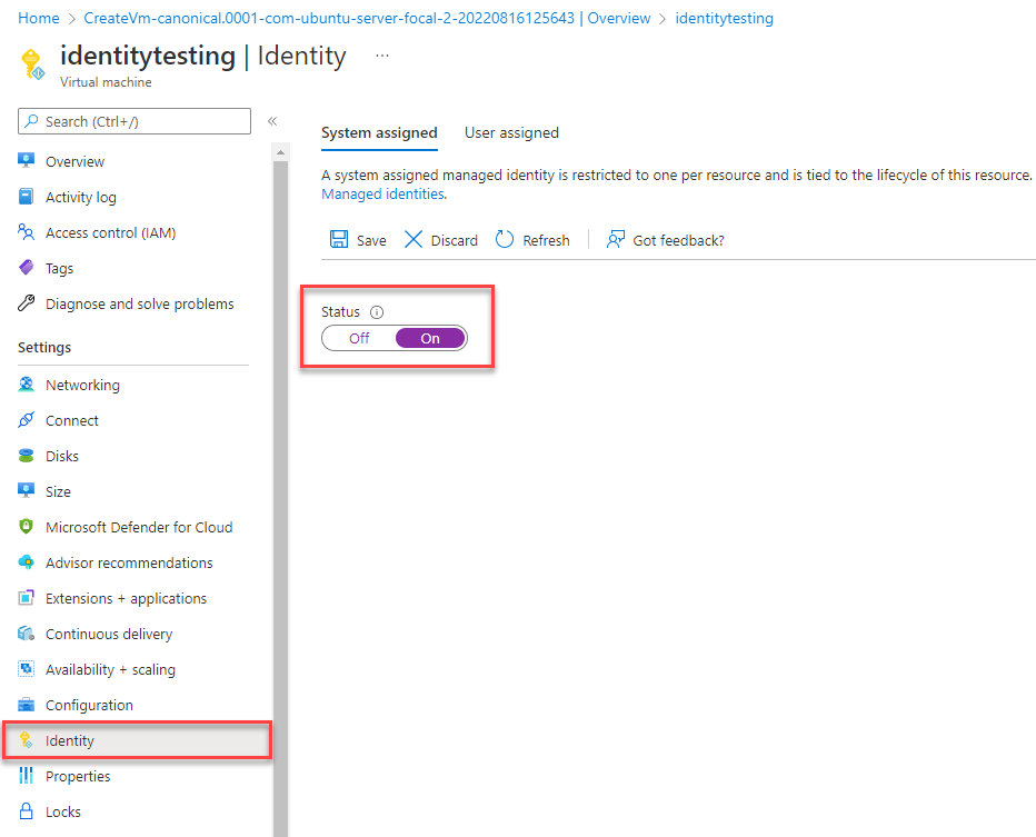 Screenshot of Azure portal Identity page of Virtual machine resource with System assigned tab showing and Status field highlighted.