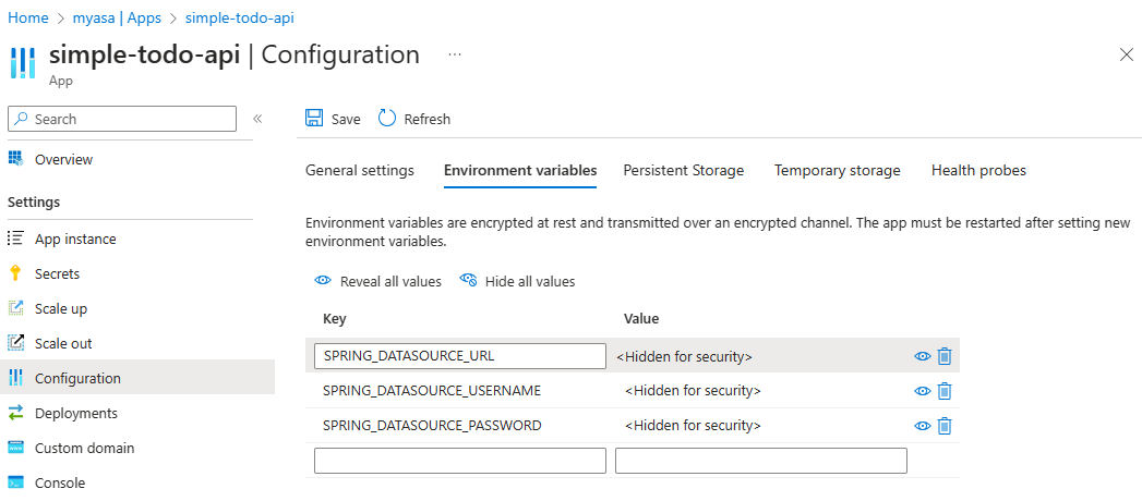 Screenshot of the Azure portal that shows the Environment variables tab with all the values for the PostgreSQL connection.