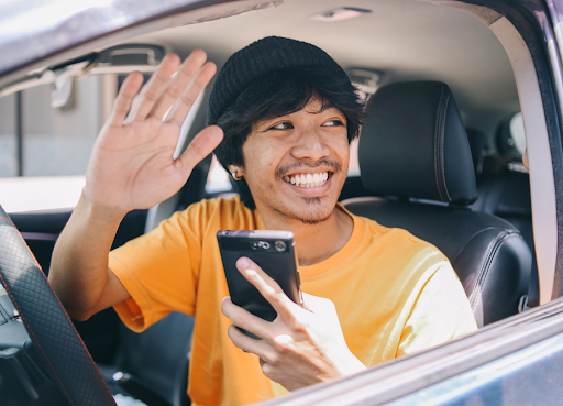 Rideshare driver hailing a rider