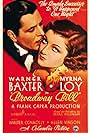 Myrna Loy and Warner Baxter in Broadway Bill (1934)