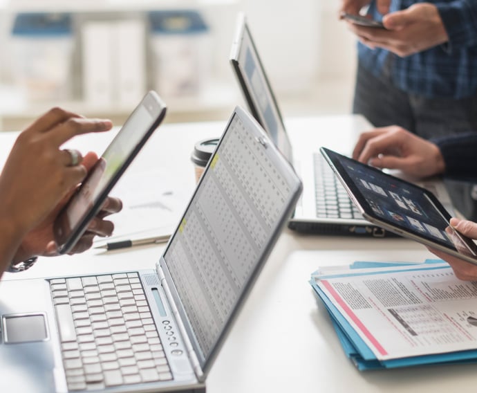 Business people using technology in office.