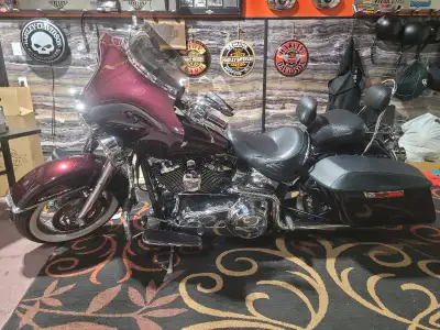 Very nice softail deluxe. Has added quick release ferring and hard bags with quick release latches....