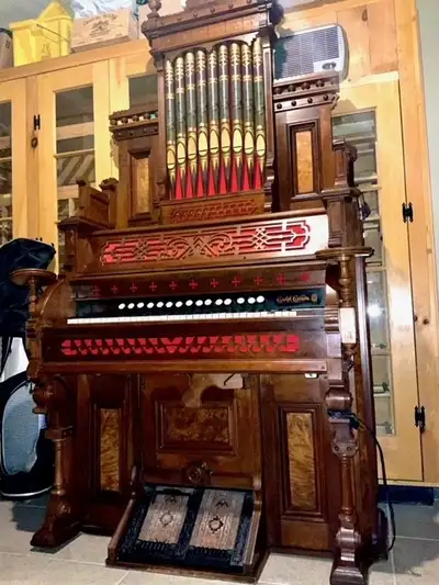 This harmonium was fabricated in Guelph, Ontario by the Bell Company. It was converted to electricit...